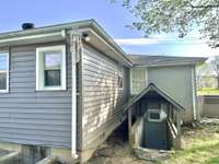Approximately 455 ft.² in this exterior entry basement endless possibilities ! Heat & Air unit above door.