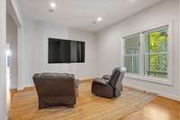 Close up of the TV area on lower level living space.