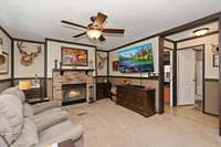 family room leading to the secondary bedrooms