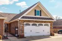 The spacious 2-car garage offers plenty of room for parking and storage, making it ideal for homeowners who need extra space for tools, hobbies, or seasonal items.