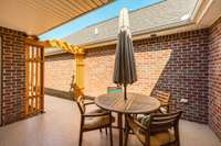 This secure, lockable space provides an ideal spot for morning coffee, enjoying fresh air, or creating a small garden retreat.