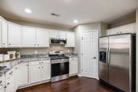 Stainless appliance are a great touch to finish off this space.