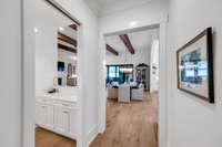 On the left and overlooking the living room, the wet bar is perfect for entertaining neighbors and guests.