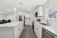 Granite Countertops with Island and New Appliances