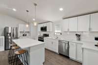 Granite Countertops with Island and New Appliances