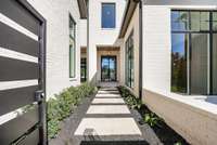 Gated Courtyard Entrace w/ Gas Lanterns to Welcome You