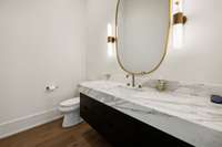 2 of 2 main floor powder baths