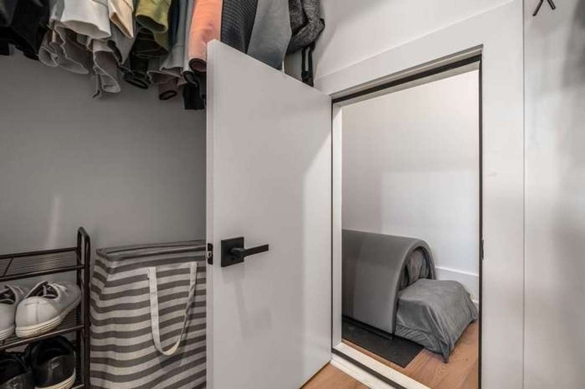 Hidden room off primary closet could be utilized as safe room or infrared sauna