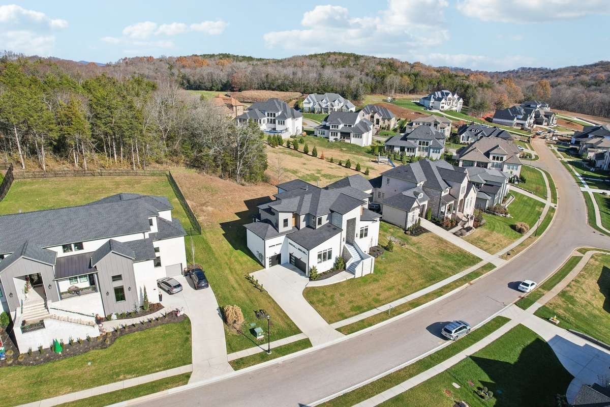 Home is on premium rare .68 acre of lot backing to treed common area