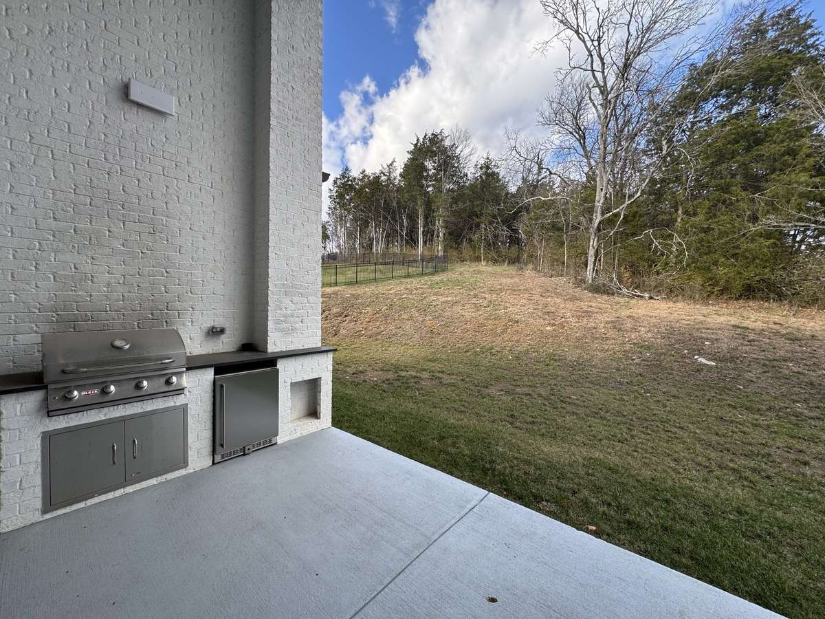 Semi-private extra large premium lot (over 1/2 acre) backing to
Treed deeded common space