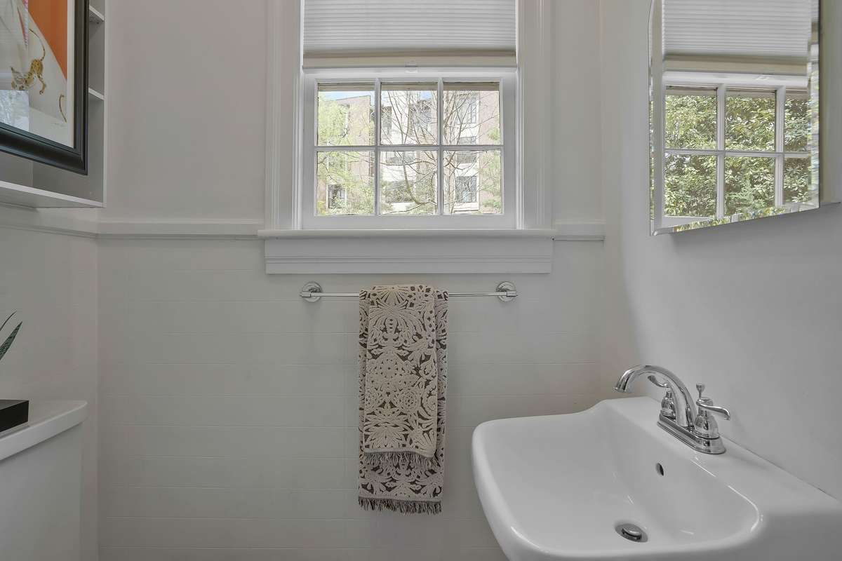 Main Level Half Bath off 3rd Bedroom/Office.