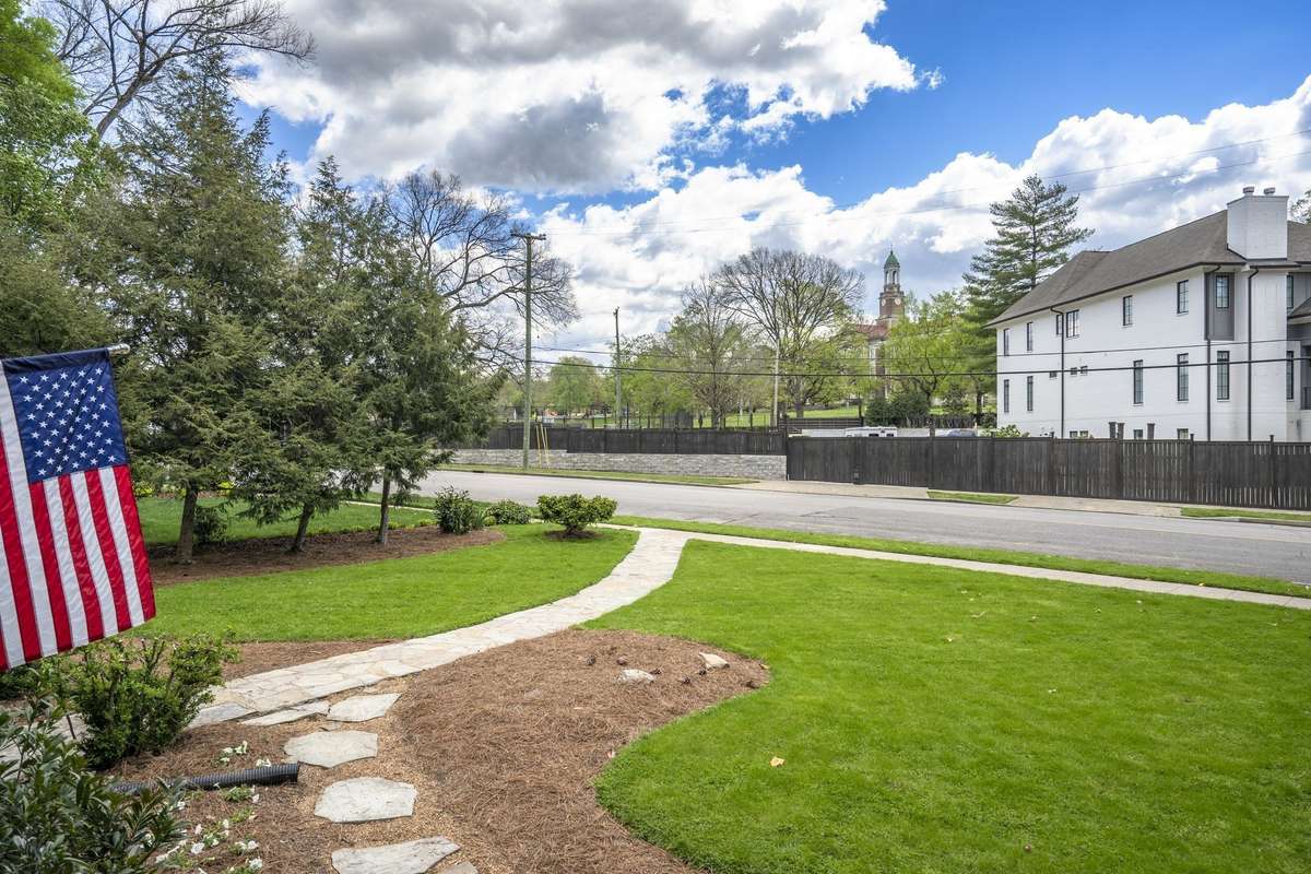 Picturesque park and school clock tower views from the side porch, day and night!  Improvements to the Bowling/Whitland intersection have significantly calmed and reduced traffic patterns, enhancing the tranquility of the area.
