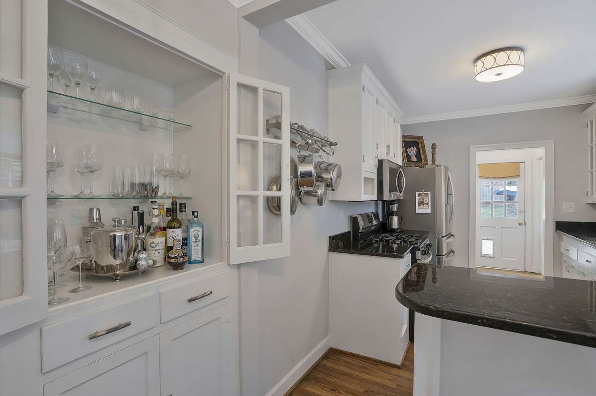 Charming Built-in cabinet with storage below.