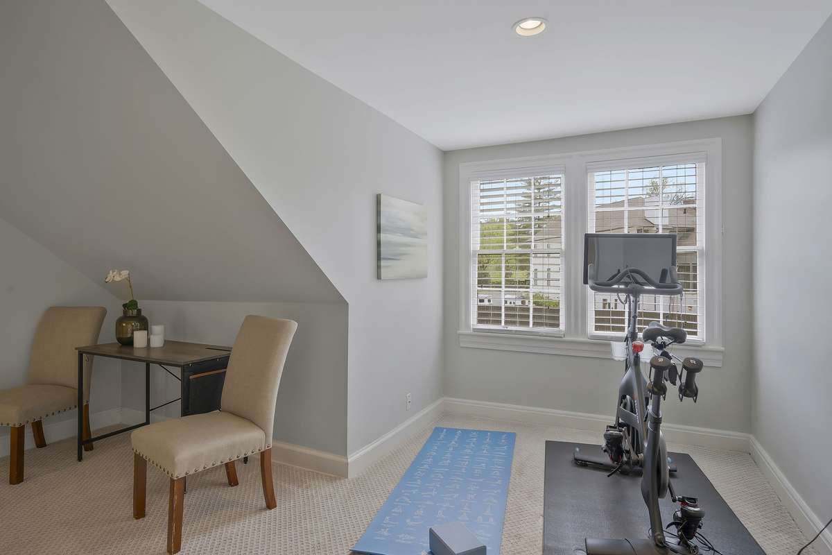 Landing area shown as a workout space with views of the park and school.