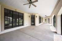 The downstairs terrace level wraparound screened porch is also very impressive.