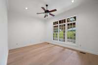 Downstairs bedroom could be a second primary or great guest room.