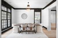 In this open floor plan walls disappear and you are in the gracious formal dining room.