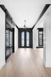 Brand new floors and custom finishes greet you when you walk into the foyer.