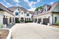 You can park 5 cars in the large garages.