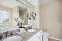Primary bath, dual vanities, shower and separate soaker tub