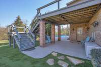Spacious deck with patio underneath for additional sitting space to enjoy the shade