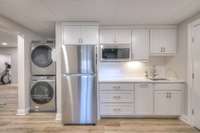 Kitchenette in basement as part of the in-law quarters.