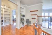 Upstairs nook with built-in shelving