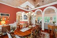 The home is "open-concept" but the architectural features give each area definition. Imagine Thanksgiving dinner served in this beautiful space!