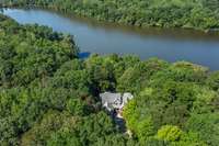 Situated on 51 acres, this setting gives you privacy, serenity, and more than a few deer and turkeys.