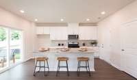 Photo is not of the actual home, but is an inspirational photo of builder’s model home and may depict options, furnishings, and/or decorator features that are not included