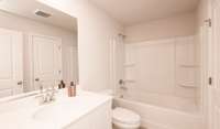 Photo is not of the actual home, but is an inspirational photo of builder’s model home and may depict options, furnishings, and/or decorator features that are not included