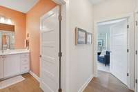 The second full bathroom is adjacent to the second bedroom.