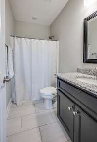First floor full bathroom perfect for guests and the secondary bedroom.