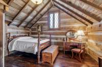 The second bedroom is accessed from the stair landing.