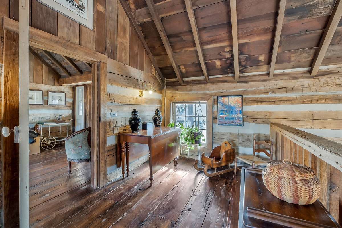 From the upstairs sitting area, you walk out to the balcony overlooking the living room. What a great place to be creative!