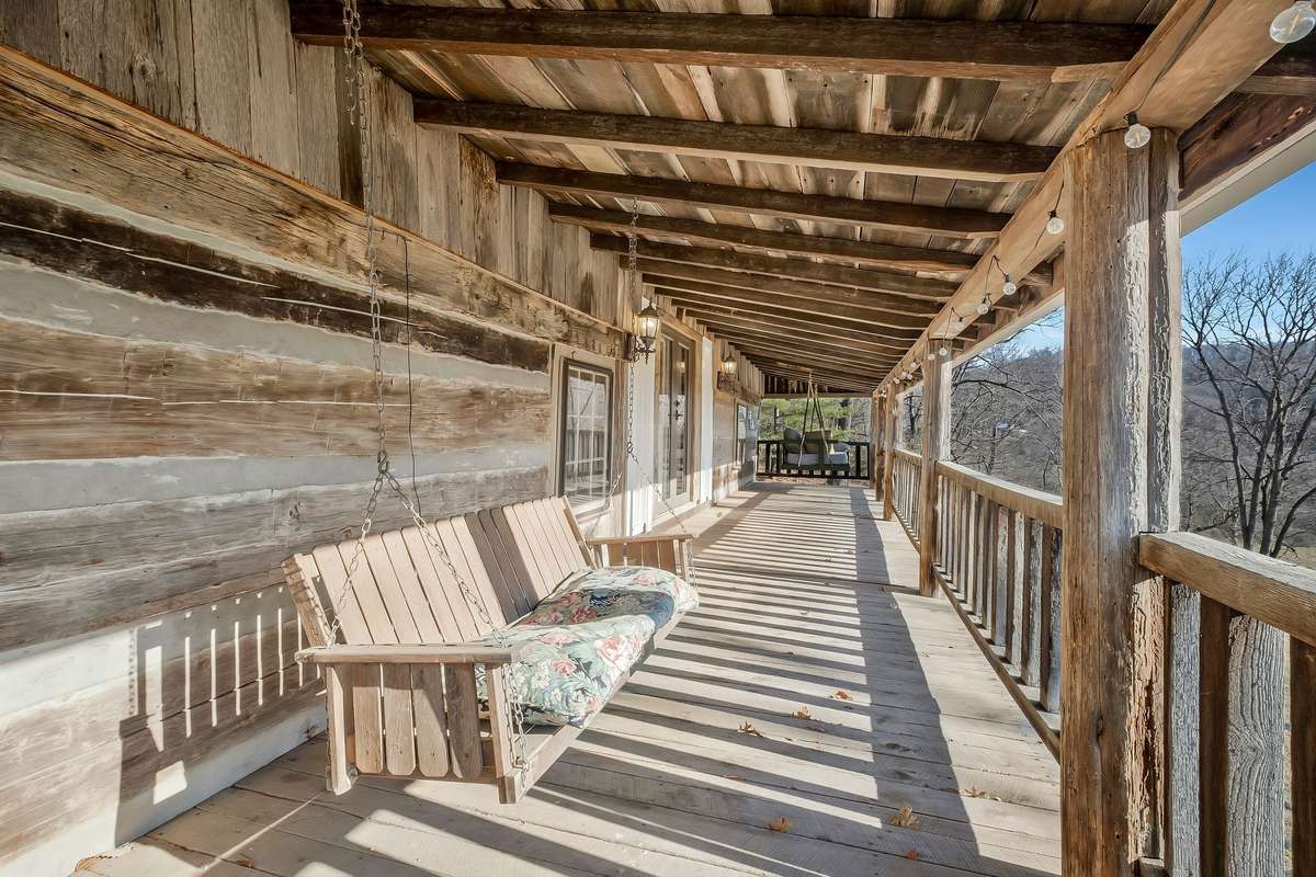 And a traditional porch swing on the other.