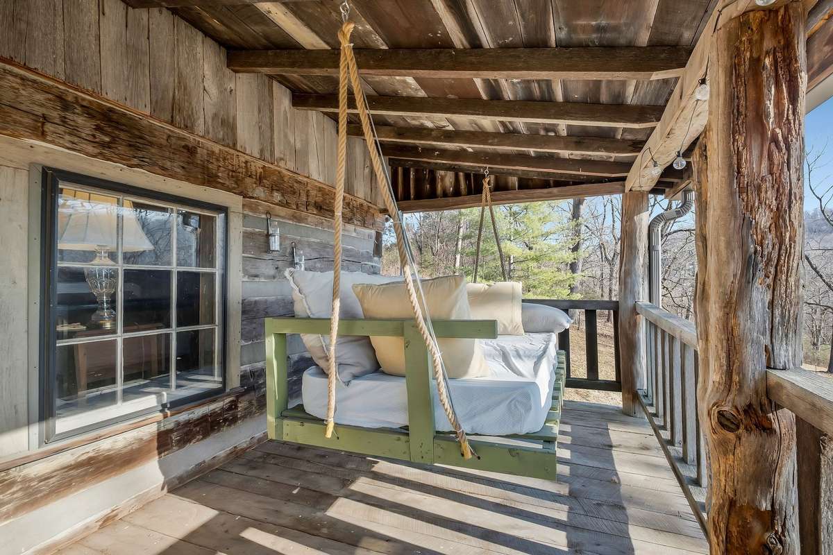 There is an inviting swinging lounge on one end.