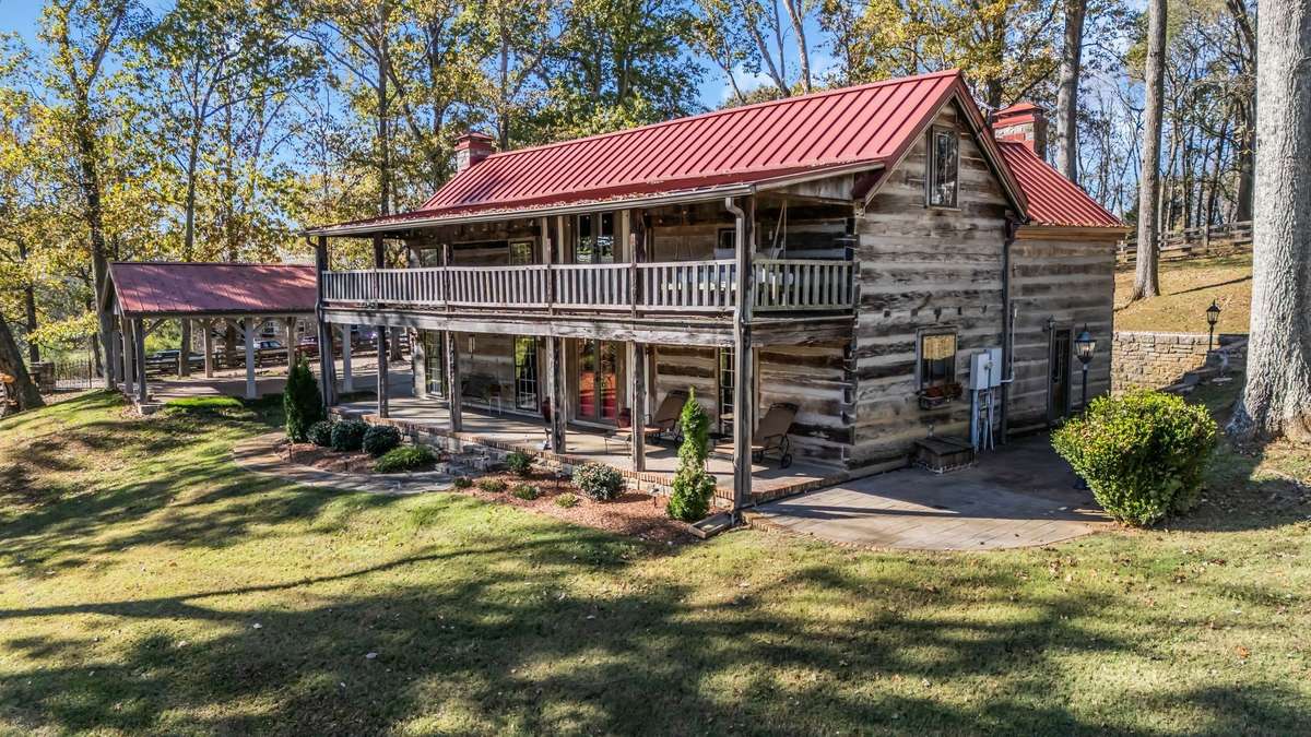 Side view showing home and carport.