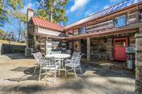 On a daily basis, you'll probably choose to enter the home through the red door to the living room. The patio is spacious.