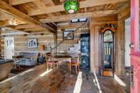 As you enter through the double doors, you'll find reclaimed brick floors that are only the beginning of many uniques features.