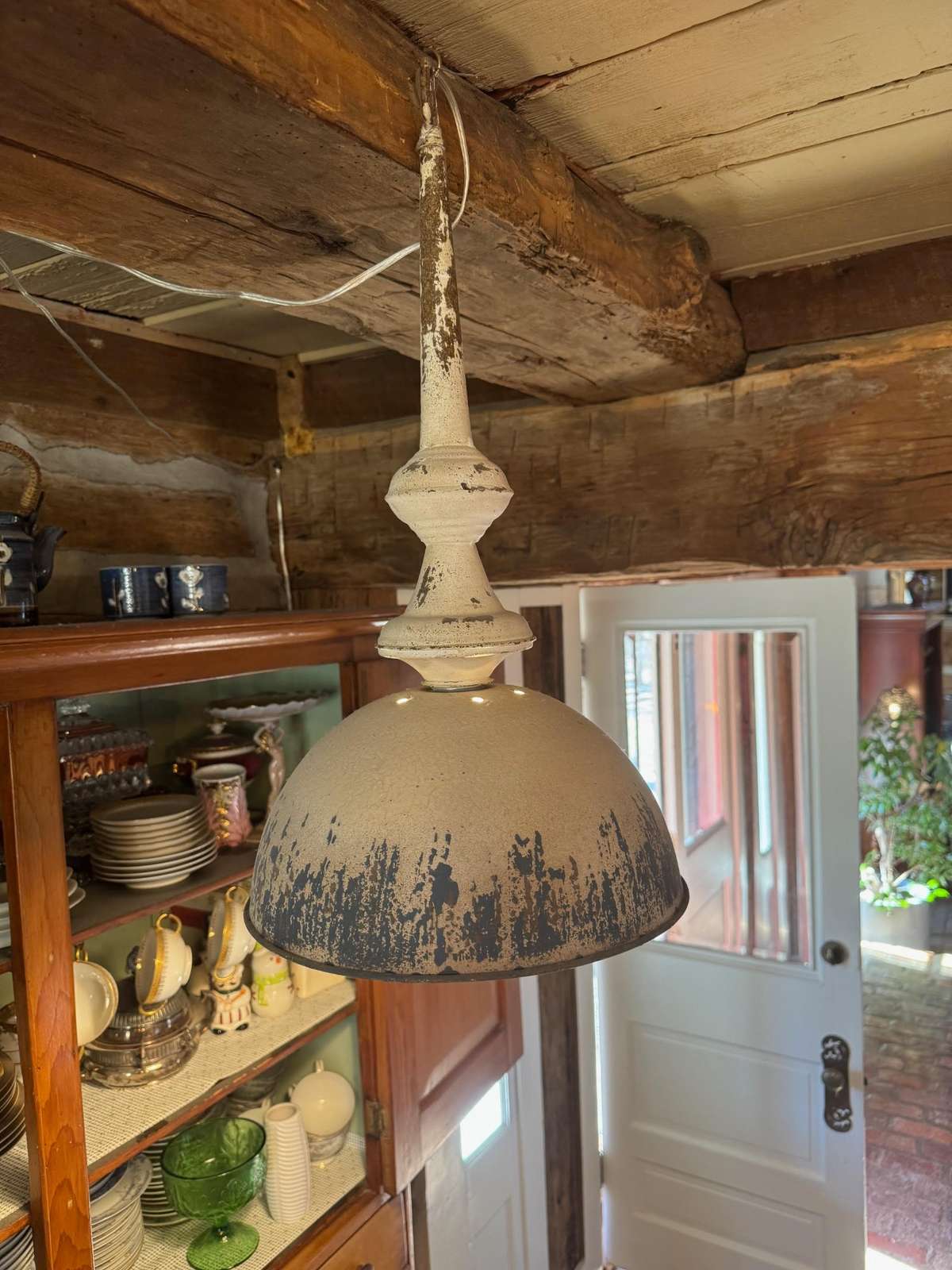 Antique light fixture in kitchen.