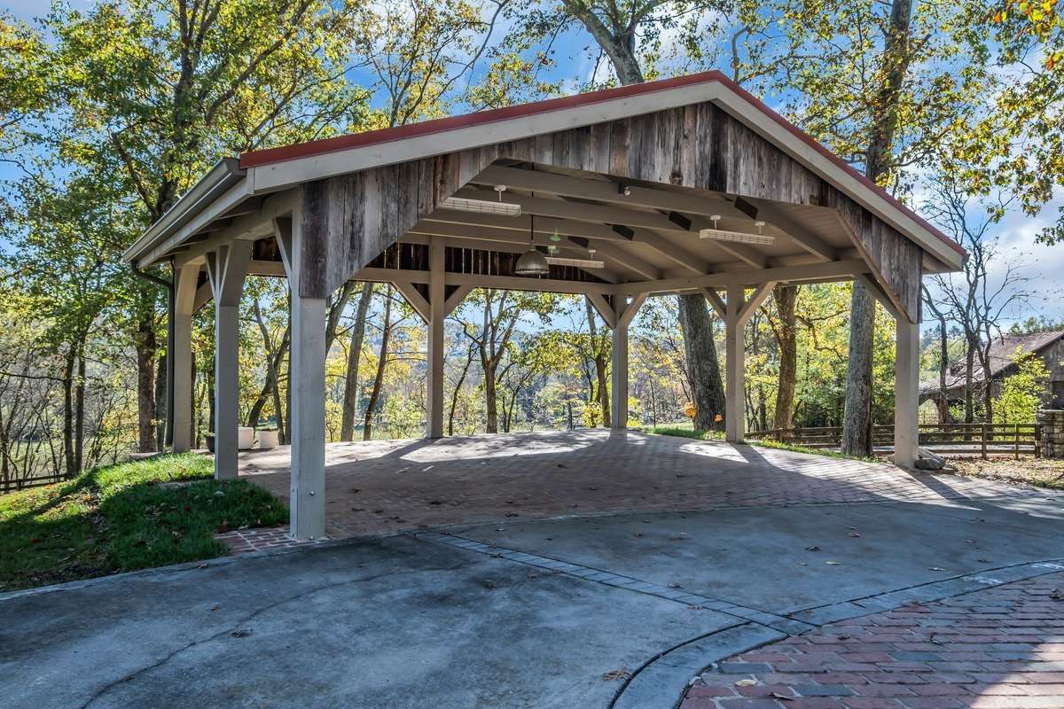 A major addition, this carport is constructed of reclaimed wood and features designer LED lighting.
