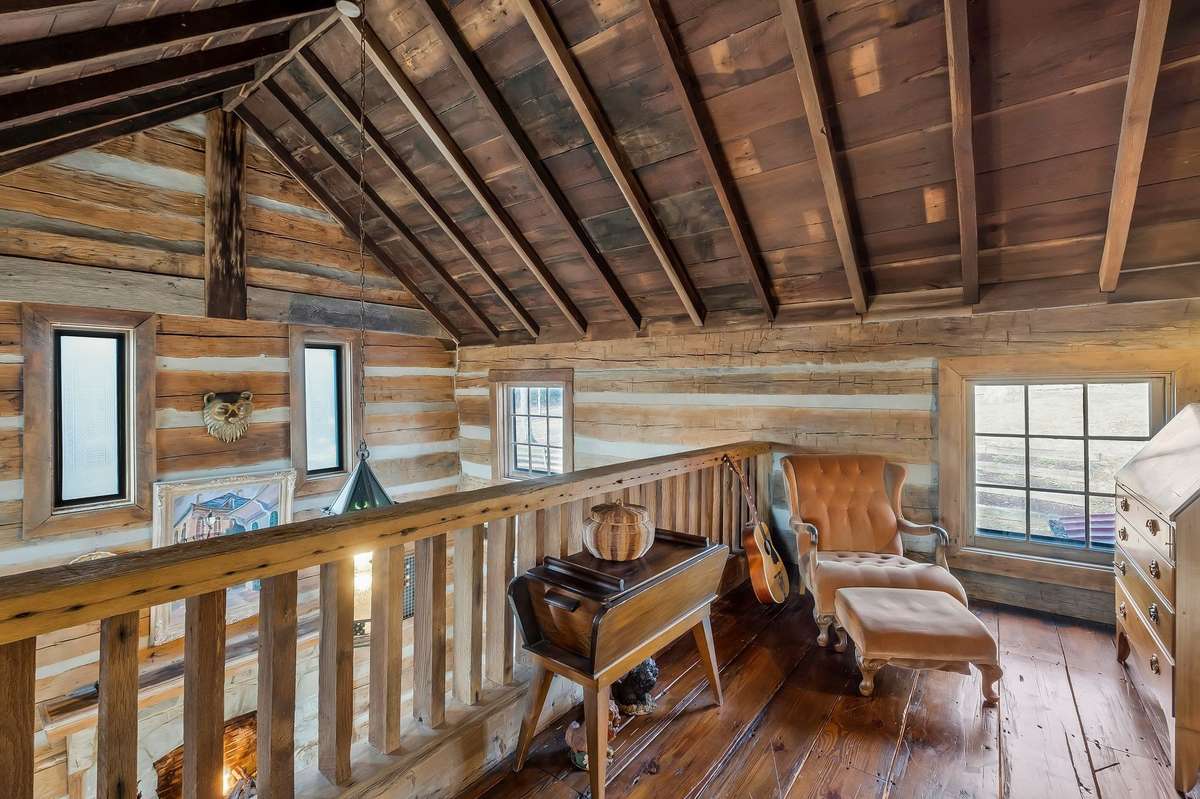 View looking over the railing to the living room.