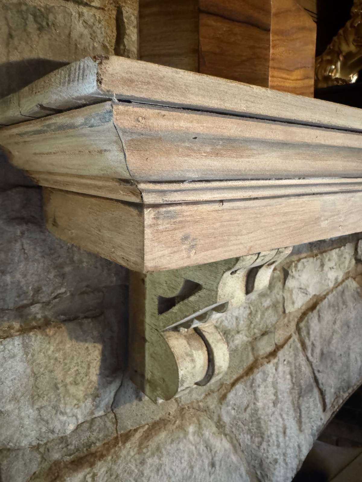 Living room fireplace mantel detail.
