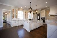 The heart of the home. Two ovens, a steam oven, microwave, beverage drawers, small appliance drawers, two dishwashers, and lots of fabulous storage.