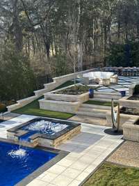 The pool is adjacent to beautiful entertainment spaces.