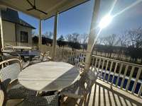 Dining al fresco is easy with this covered porch near the breakfast room.