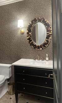 Elegant powder room off the family room.