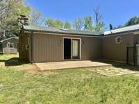 The larger back patio walks straight out into the fenced in back yard and the patio area!!