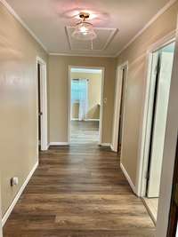The hallway that leads to the two bedrooms, bathroom, and utility room!!